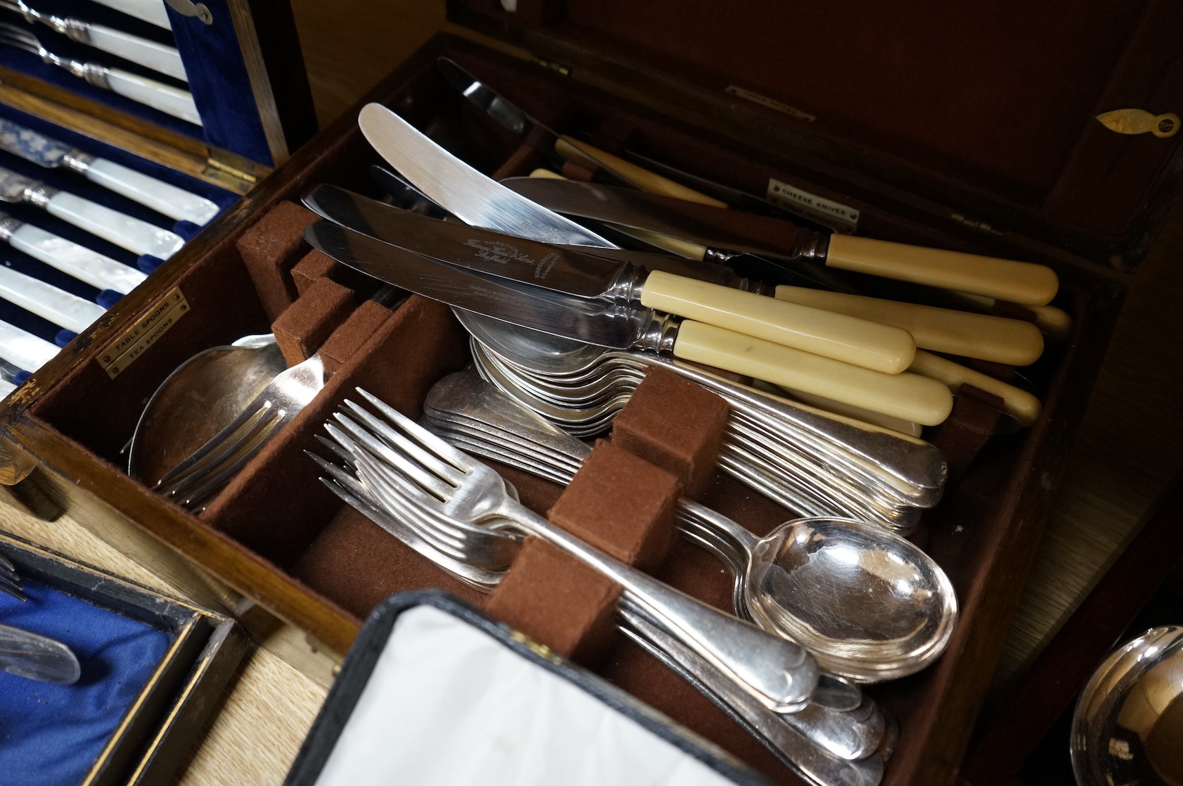 A group of assorted cased plated flatware and a cased set of six Edwardian silver teaspoons by Charles Wilkes, Birmingham, 1904. Condition - fair